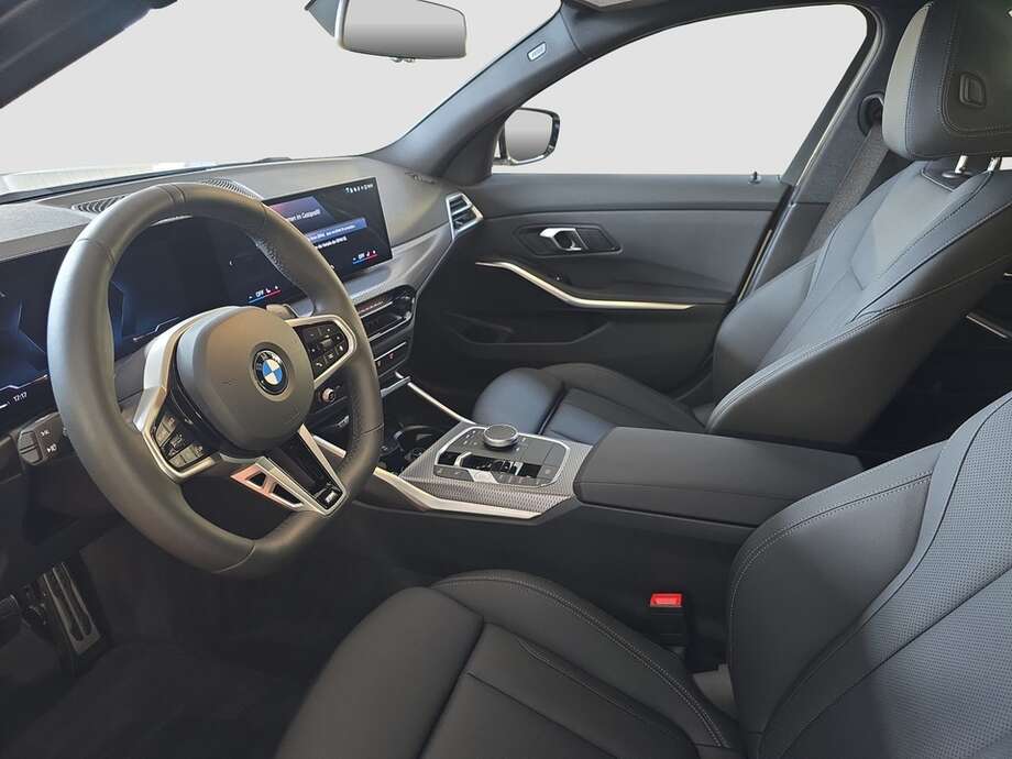 BMW 318d (Bild 2/18)