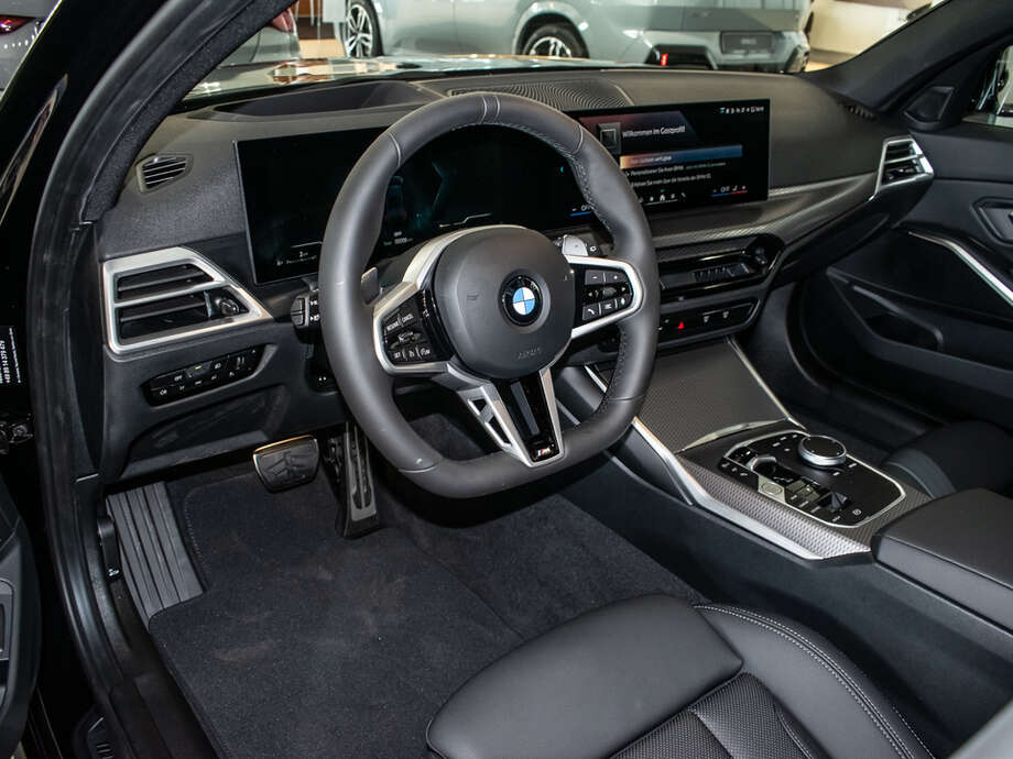 BMW 320d (Bild 12/16)