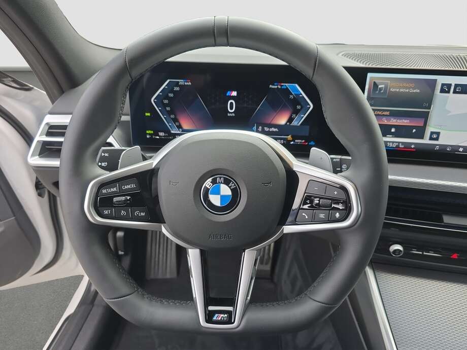 BMW 320d (Bild 4/18)