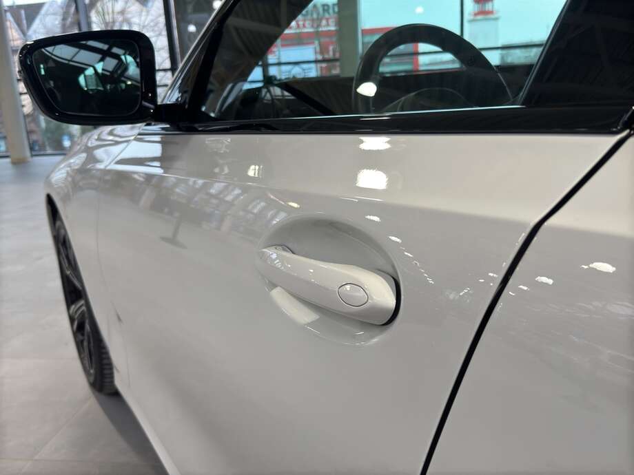 BMW 320d (Bild 13/14)