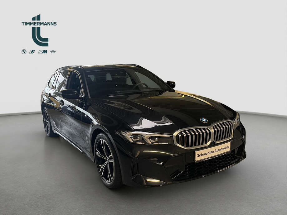 BMW 318d (Bild 7/14)