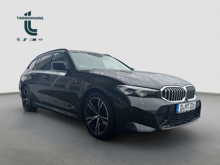 BMW 318d (Bild 6/15)