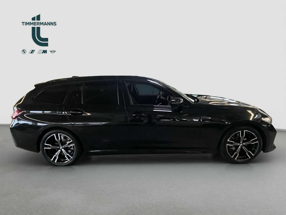 BMW 318d (Bild 6/14)