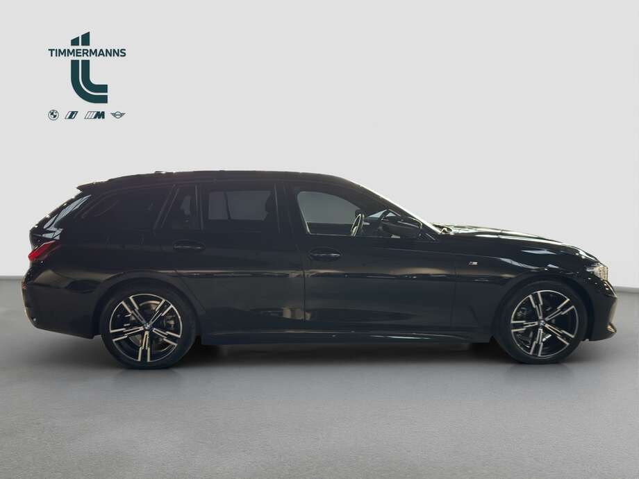 BMW 318d (Bild 6/15)