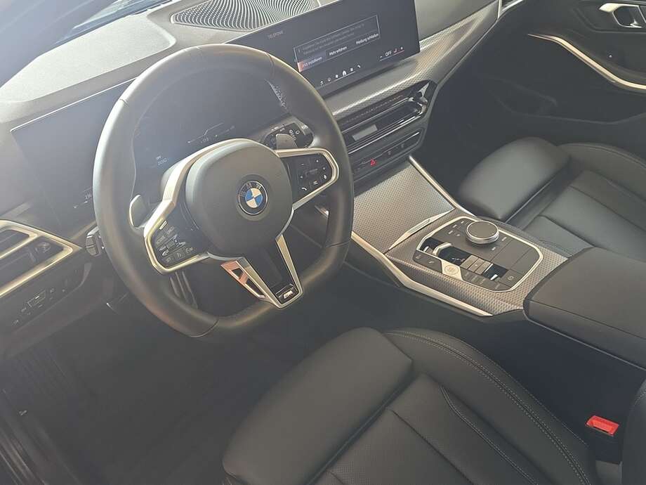 BMW 318d (Bild 10/18)